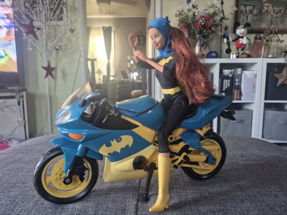 Batgirl Barbie with bike
