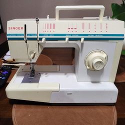 Maquina De Coser Singer.