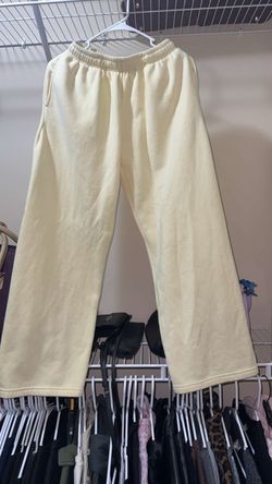 Yellow cotton sweatpants with pink bow