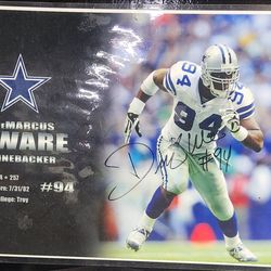 Ccollectible autographed photo of former Dallas Cowboys linebacker DeMarcus Ware.