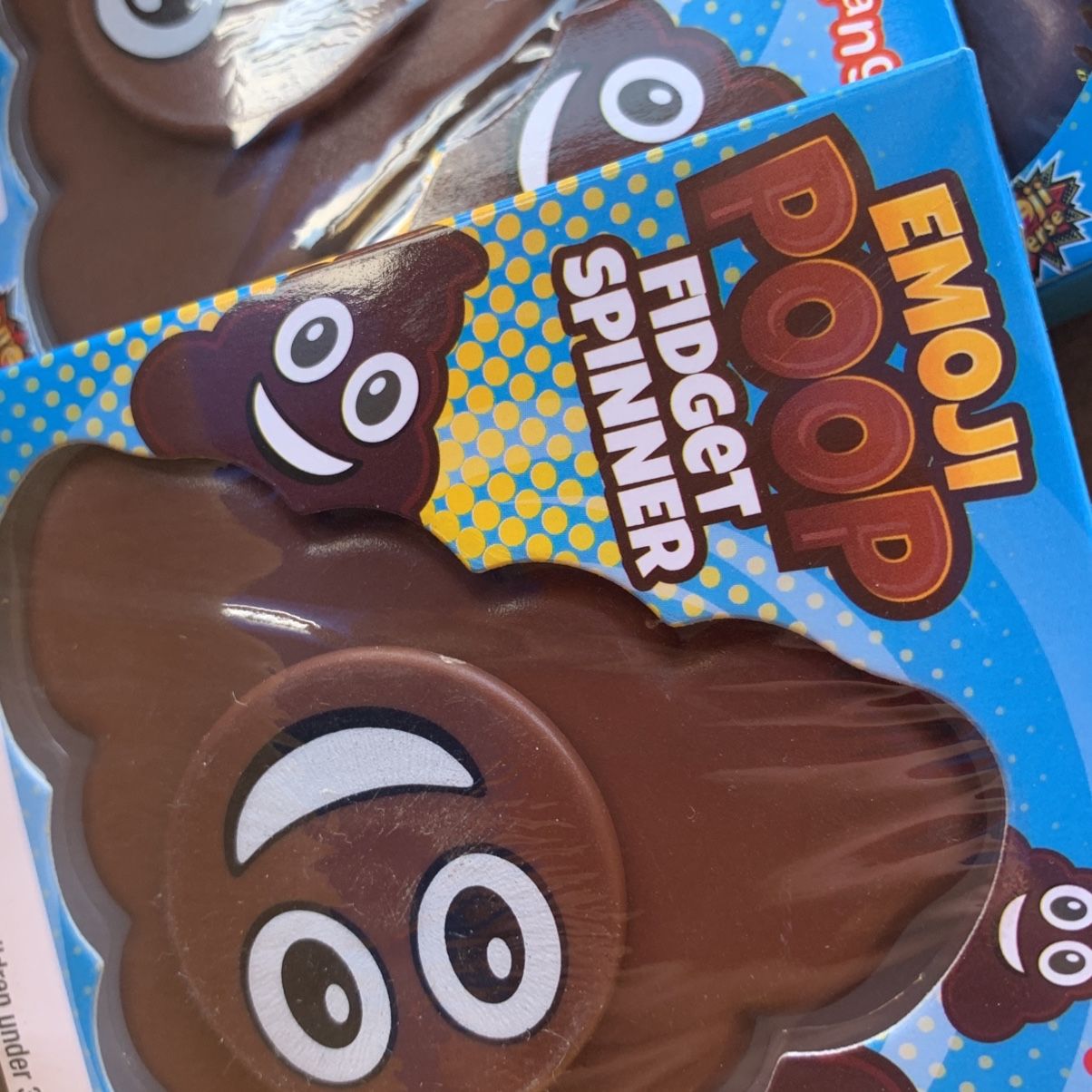 Poop emoji fidget spinner 2025
