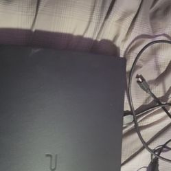 Ps3, 4 games, and 2 controls.