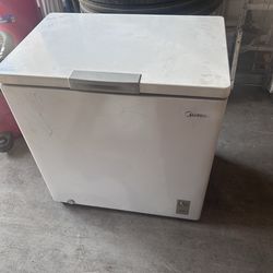 Midea on ground freezer