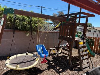 Wooden Swing Set with Slide and Climbing Wall
