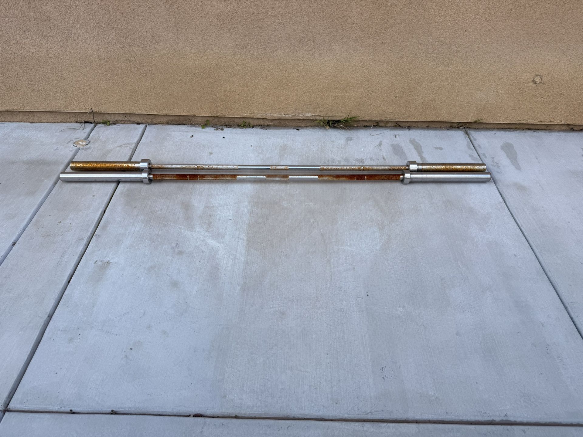 2 Olympic Weight Bars $25 Each