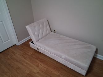 L Shape couch folds down to bed/ has storage