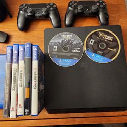 Ps4 With Two Remotes And Games