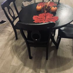 Black Table With 4 Black Chairs
