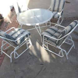 Metal Glass Table With 4 Chairs & Cushions Very Comfortable.