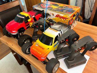 Vintage Traxxas Spirit, Rustler, and Stampede