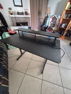 Gaming desk, charging station and outlets