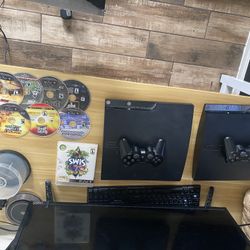 2 PlayStation 3 Slims and 8 games