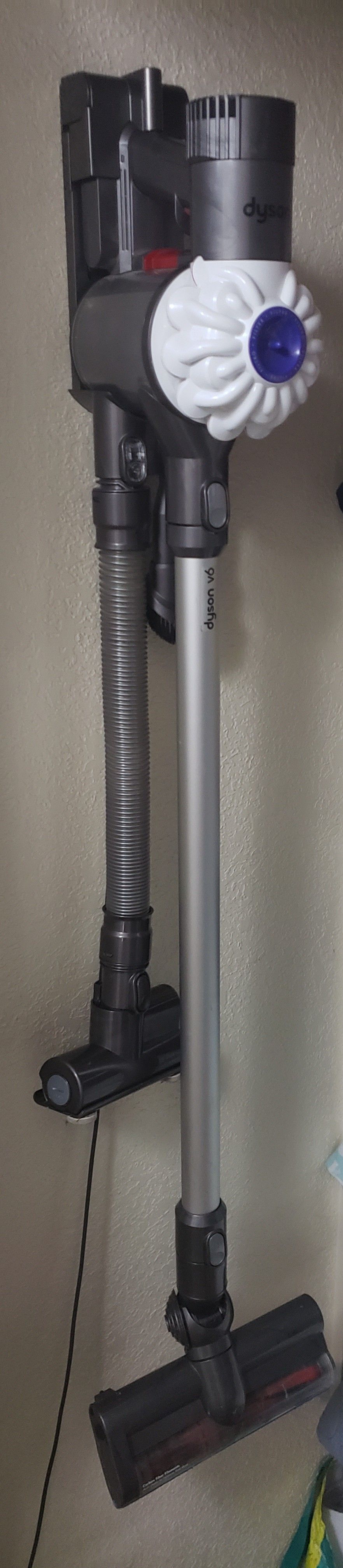 Dyson V6 cordless vacuum with attachments