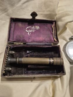 An empty metal case in this weathered, tarnished condition