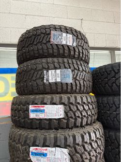 33X12.50R22 SET OF 4 MUD TIRES WITH INSTALLATION AND BALANCING