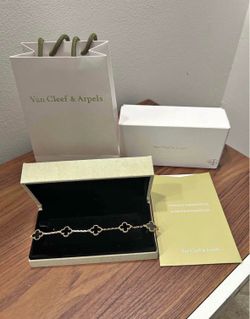 Van cleef black and gold bracelet