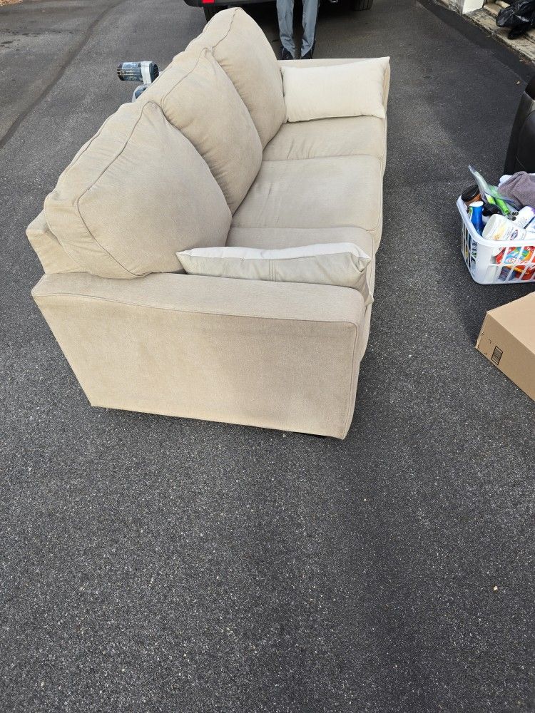 Tan Couch With Pillows