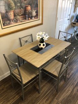 Gray dining table set with 4 chairs