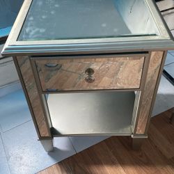  Pier One Imports handcrafted weathered oak mirrored One Drawer Nightstand. Silver pulls and a mirrored top and sides. Generous storage space.   Dimen