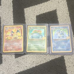 Pokémon card lot-25th anniversary charizard,blastoise,and venasaur