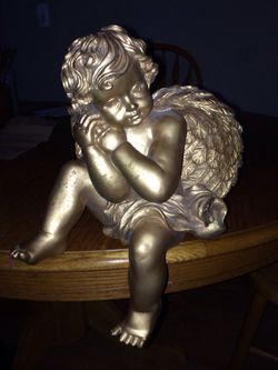Rustic gold colored Cherub