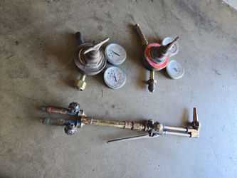 Eighteen inch, VICTOR cutting torch set up with regulators
