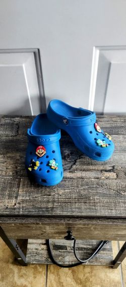 blue croc shoes with charms