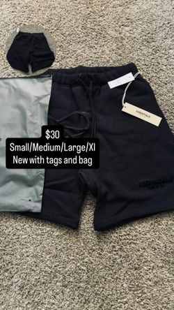 Black essential fear of god sweats