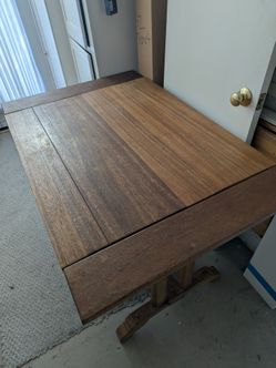 Wooden Table (30" depth x 47" wide* x 30" high)
