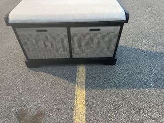 Wooden Bench With Two Wooden Baskets , And A Cushion on top .  32 1/2” wide  15” Deep  19” tall  