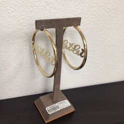 A 10K Pair Of Gold Nameplate Hoop Earrings
