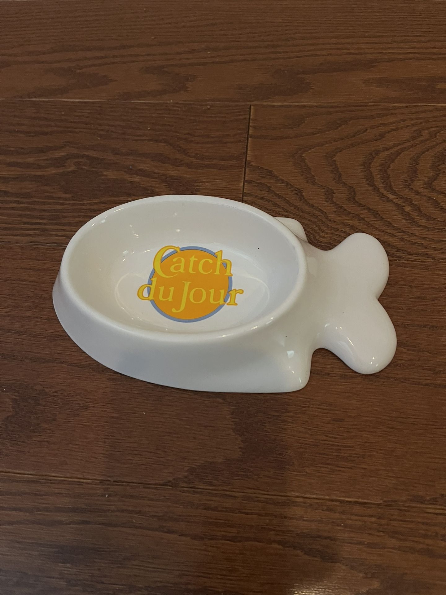 Avon Cat Food Bowl/Water Dish With The Words Catch du Jour written in it ,made of stoneware