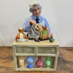 Royal Doulton Collectible Figurine “The China Repairer”