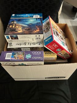 Lot of 7 1000-Piece Jigsaw Puzzles