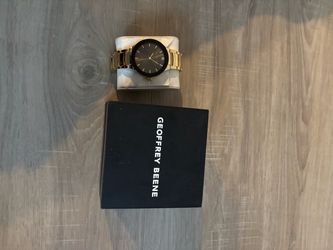 Geoffrey Beene Gold-Tone Watch with Black Dial