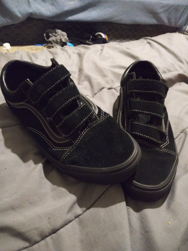 All black old skool vans