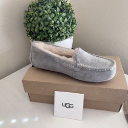 UGG Slippers .  Brand New In Original Packaging .