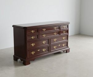 (10 Draw Dresser) The first picture is a A.I. visual of how this dresser can look in a room....
10 drawer wooden dresser
34 Height,  66 x 19.5 
Exelle