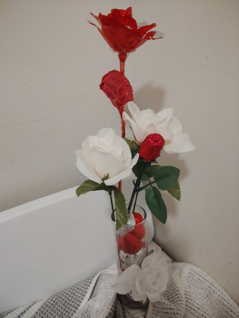 Valentine Vases Filled With Candy Lights And Decorations And A Valentine Day Card