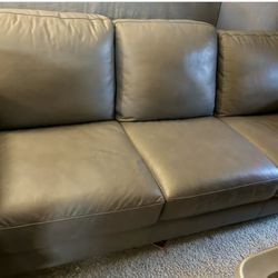 Macy’s Gray leather couch in great condition!