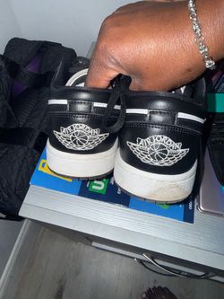 Black and white Nike 1’s