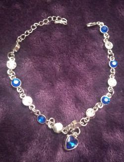 Blue & White CZs adorn this fashion Bracelet