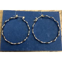 Silver Toned Hoops.