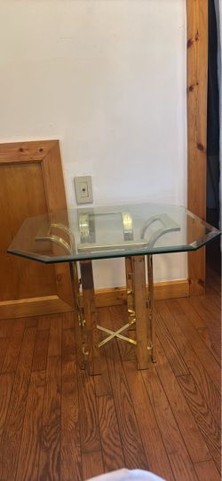 Gold metal end table with glass top