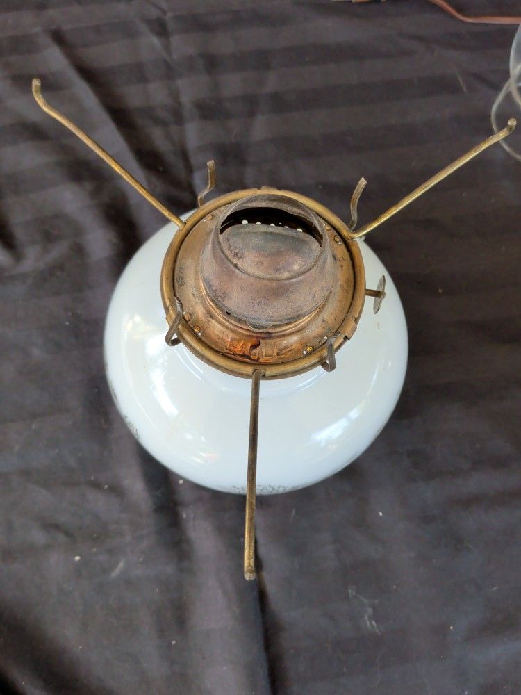 Oil Lamp. Currier And Ives