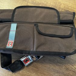 Chrome waterproof sling bag. 