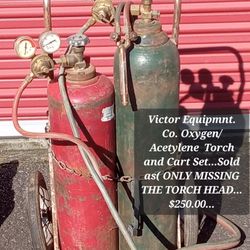 Victor OXYGEN/ ACETYLENE TORCH SET.... Victor GUAGES, VICTOR MIXING VALVES,VICTOR TORCH... TORCH HAS NO TORCH HEAD... TANKS EMPTY...