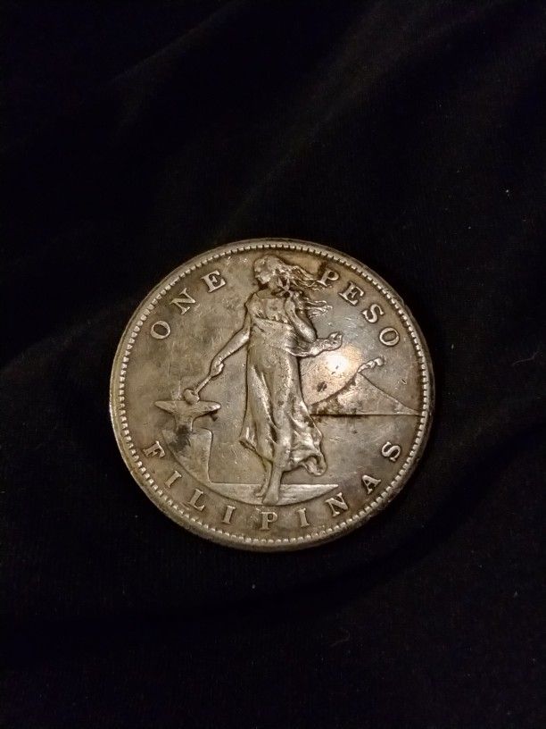 It's A 1907 One Peso From The Philippines In Good Shape
