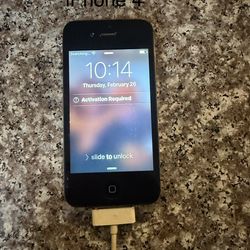iPhone 4 with charging cable