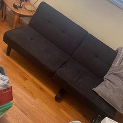 Black Couch/folds Into A Bed